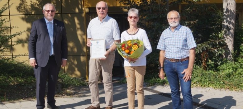 Landrat Ihlenfeld mit Ehepaar Budde
