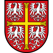 Wappen von Altleiningen. Rot, geviertelt von einem gelben Kreuz, in den Vierteln je ein weißer Adler. 