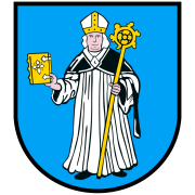 Wappen von Obersülzen. Mann mit Mitra, Buch und Krummstab vor blauem Hintergrund. 